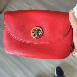 Tory Burch small red crossbody bag.